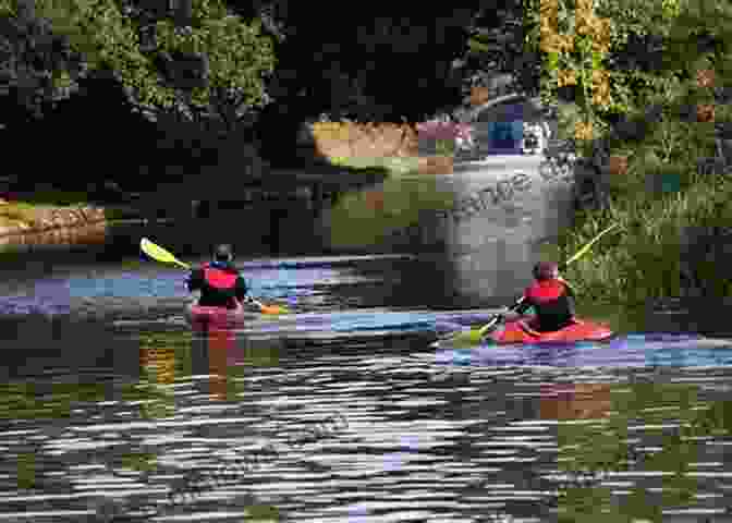 A Family Of Four Kayaking Through A Tranquil Canal LIFE IS GOOD Follow Us: A Family Kayak Odyssey 7 300 Km From Copenhagen To Istanbul