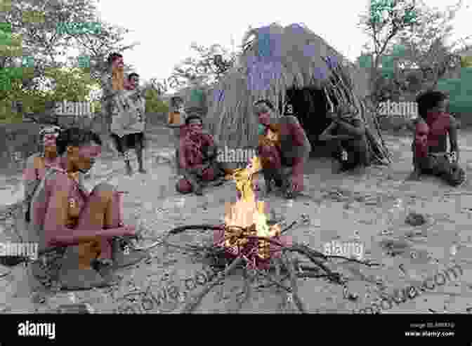 A Group Of San People Sitting Around A Fire, Singing And Dancing Our Best African Safari Yet: Adventures In Botswana