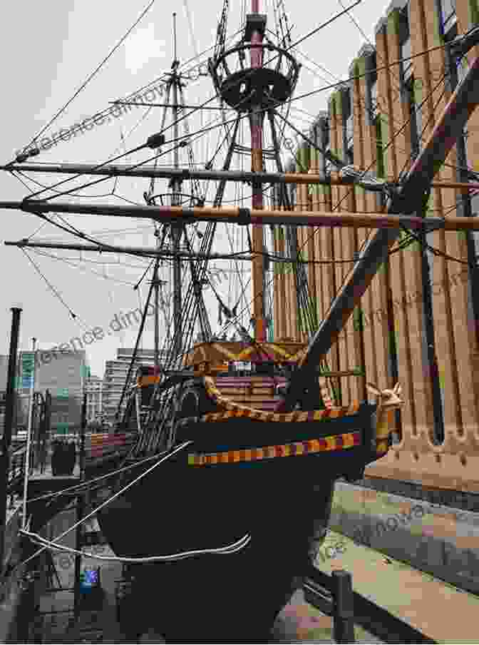 A Replica Of The Golden Hind, The Ship On Which Sir Francis Drake Circumnavigated The Globe, Sails Across The Ocean, Symbolizing Drake's Daring Voyages And Maritime Prowess. Sir Francis Drake (Great Explorers (Chelsea House))