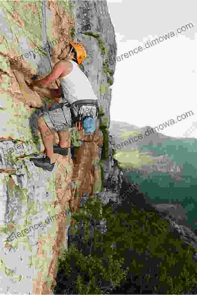 Alain Smith Scaling A Steep Rock Face With Breathtaking Mountain Views In The Background Adventures In Rugged Places J Alain Smith