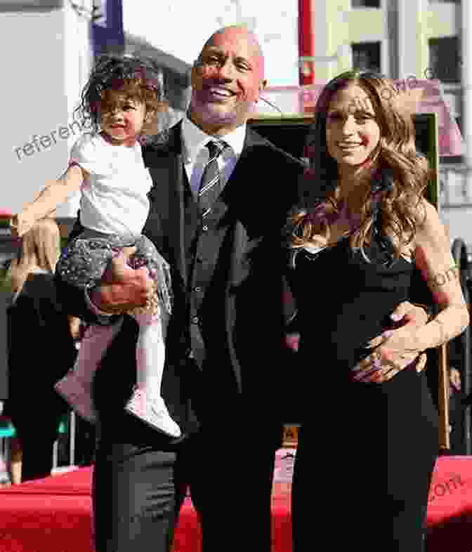 Dwayne Johnson With His Wife And Daughters The Life Story Of Dwayne Douglas Johnson: Dwayne Johnson A Famous American Canadian Wrestler Actor And Poducer