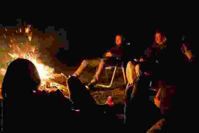 Hikers Sharing A Meal And Laughing Around A Campfire In New Zealand Face Of The Mountain ~ True New Zealand Alpine Hiking Adventures: True New Zealand Alkpine Hiking Adventures