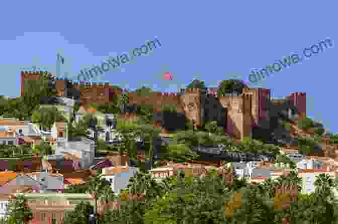 Panoramic View Of The Imposing Silves Castle, A Moorish Fortress Algarve TRAVEL GUIDE Portugal 2024 The Locals Travel Guide For Your Trip To Algarve: 55 Secrets Algarve Travel Guide